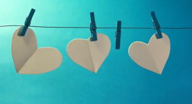 Hearts pinned on a clothesline with one empty pin